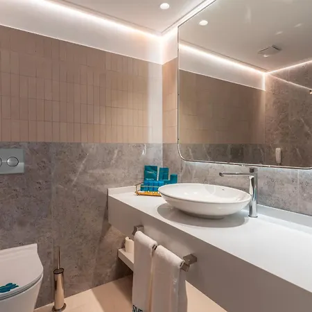 Otel Qlusive